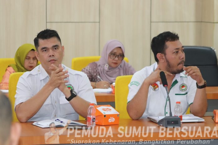 Text foto : Ketua Harian APPSI Sumut Syam Purba dan Sekretaris Harmudia Syahputra saat melaksanakan rapat Kordinasi. (Foto : Istimewa)