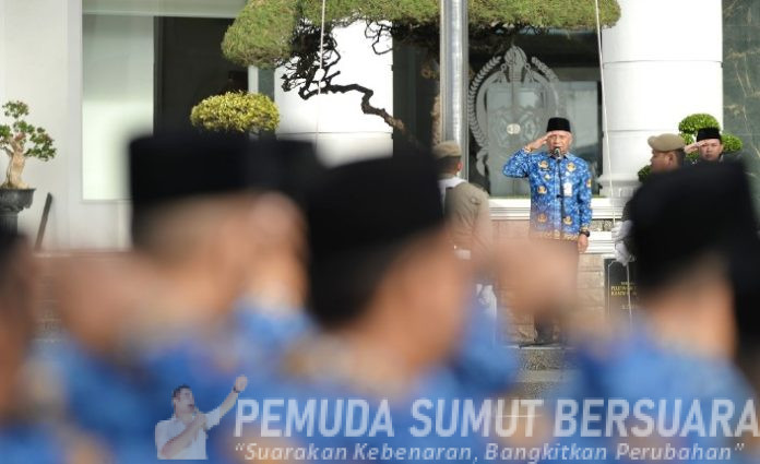 Teks Foto : Wakil Gubernur Sumatera Utara (Sumut) Surya menjadi Inspektur Upacara (Irup) pada Upacara Hari Kesadaran Nasional di Lapangan Apel Kantor Gubernur Sumut Jalan Diponegoro Kota Medan, Rabu (18/2/2026). (Foto : Ist)